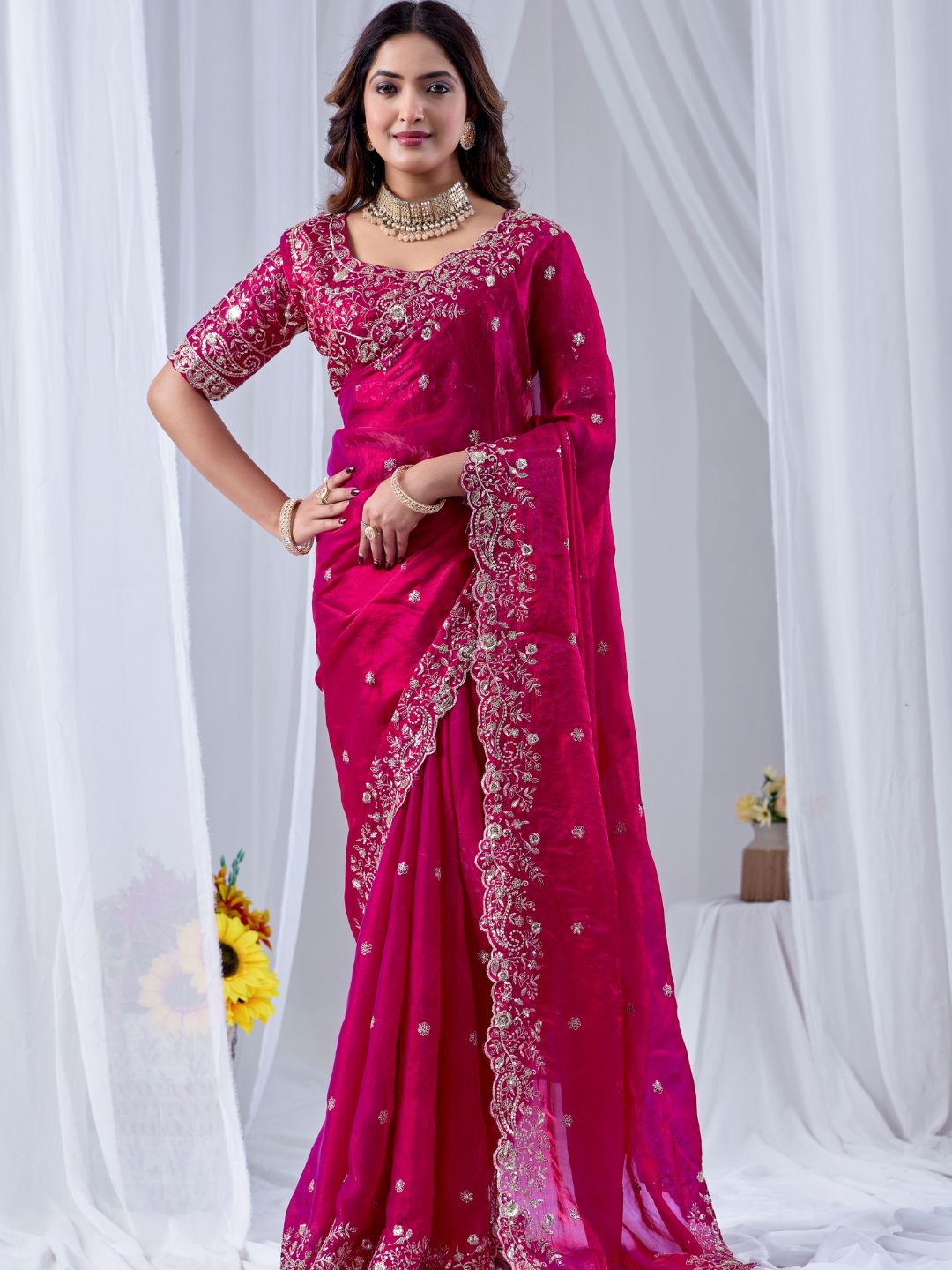 Fuchsia pink embroidered silk saree with designer blouse