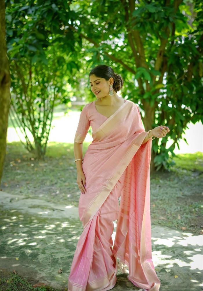 Delicate Pink Saree with Lustrous Finish and Gold Pallu