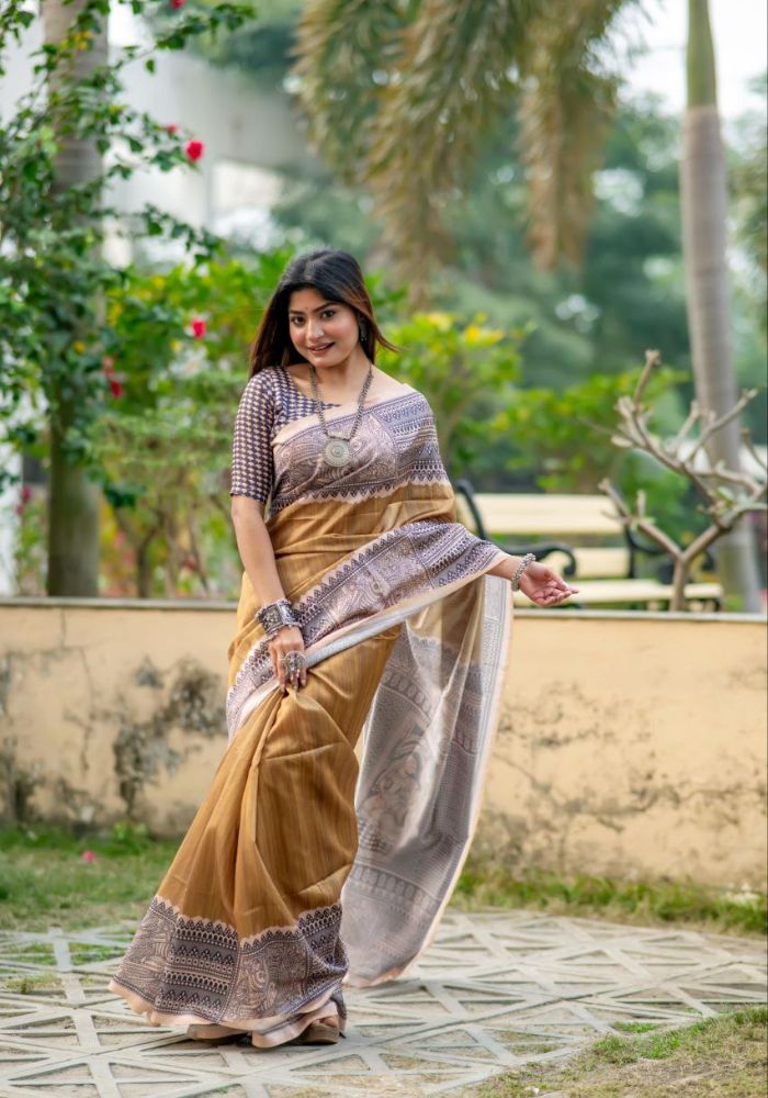 Trendy Festive Saree in Mustard with Heritage Tribal Art