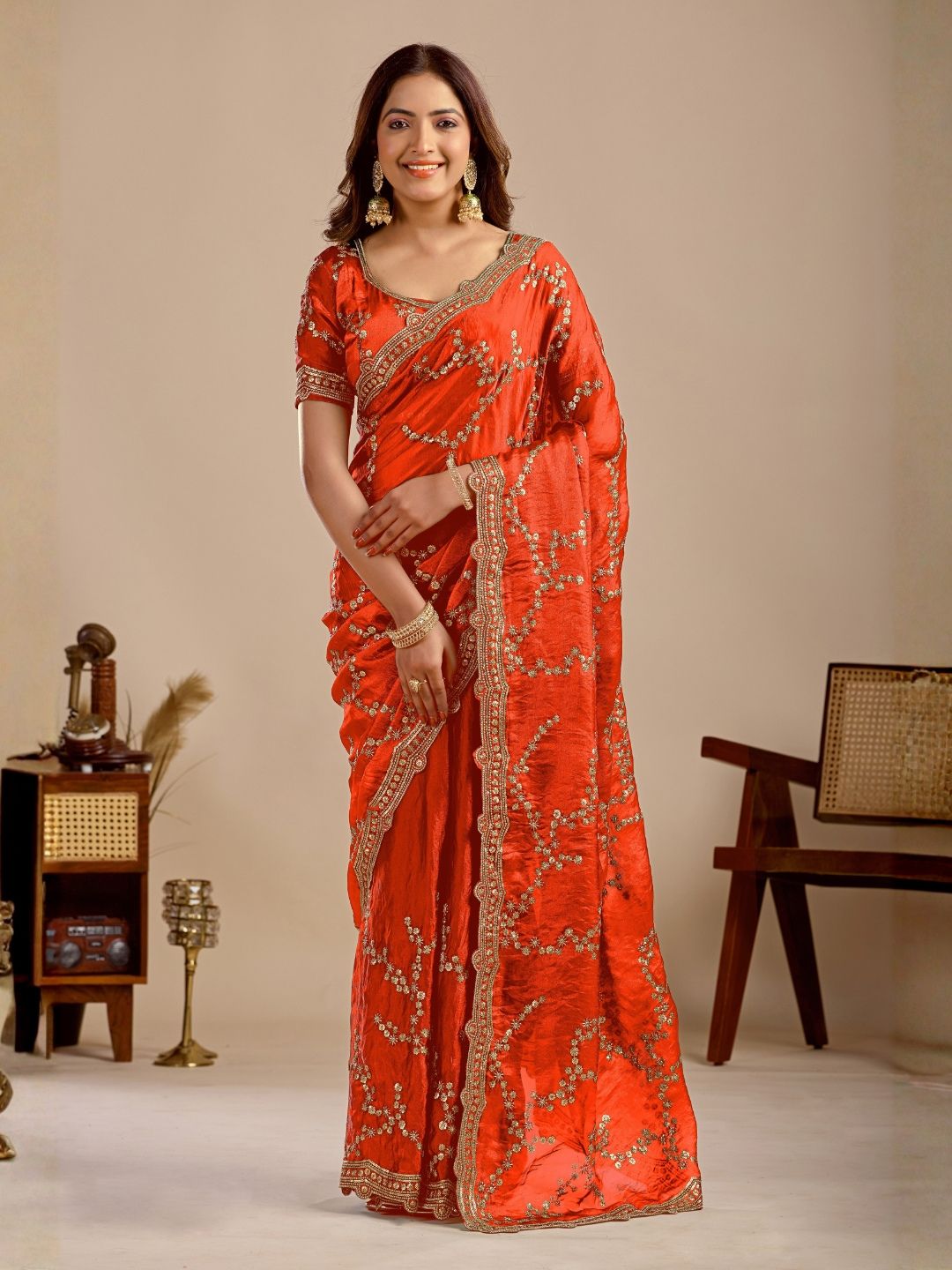 Orange embroidered silk saree with designer blouse