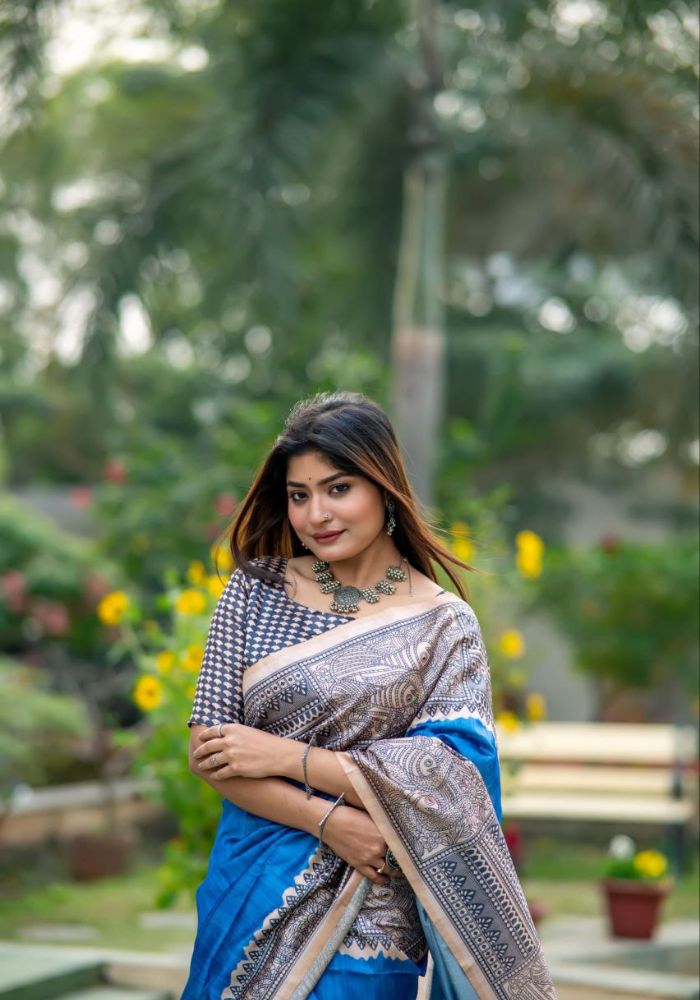 Trendy Festive Saree in Blue with Heritage Tribal Art