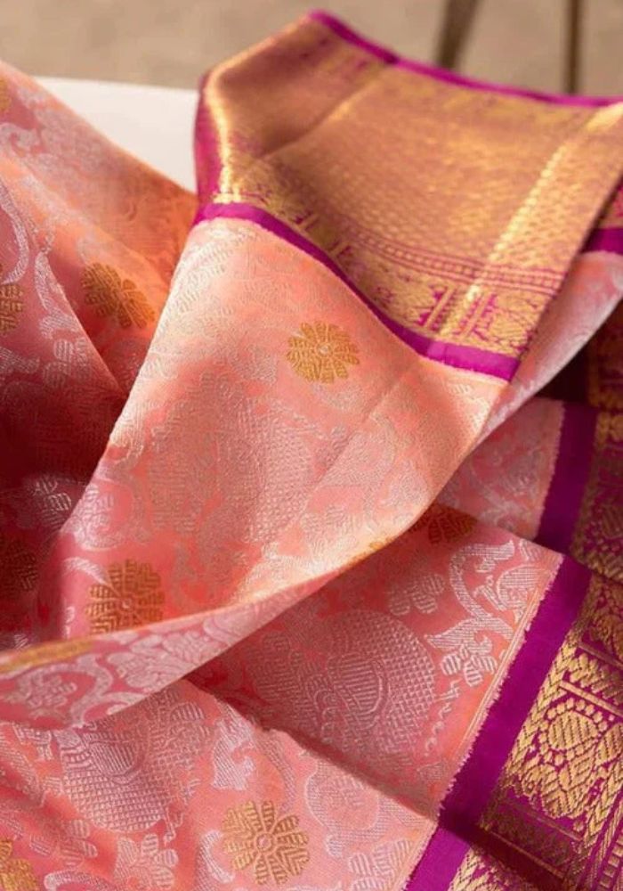 Peach Banarasi Satin Silk Saree with Golden Zari & Magenta Border