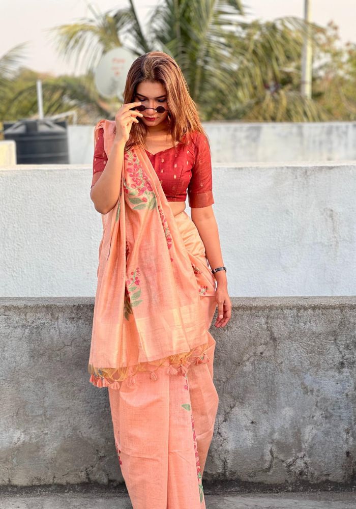Elegant Floral Printed Peach Saree with Designer Pallu and Tassels