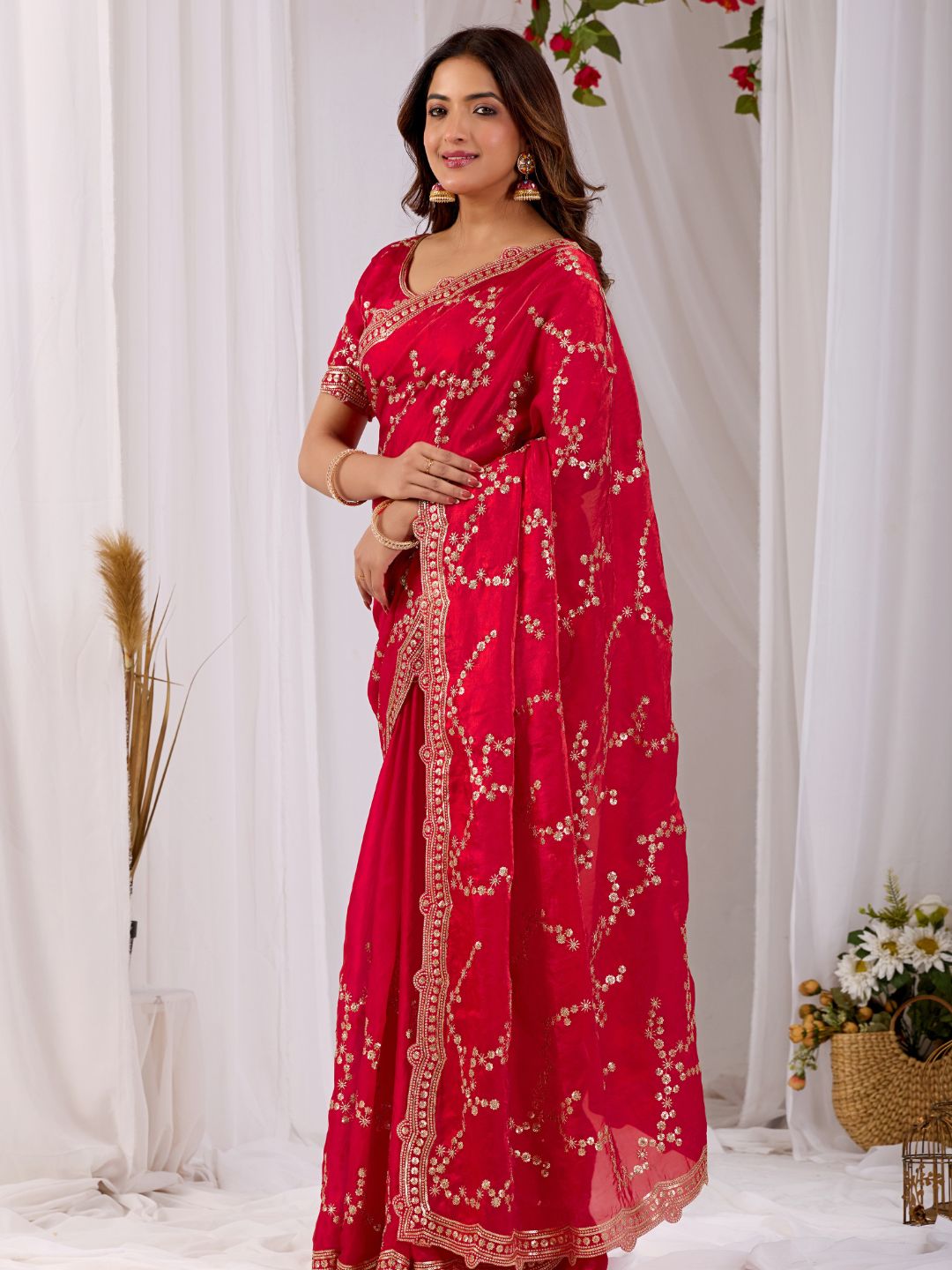 Rani pink embroidered silk saree with designer blouse