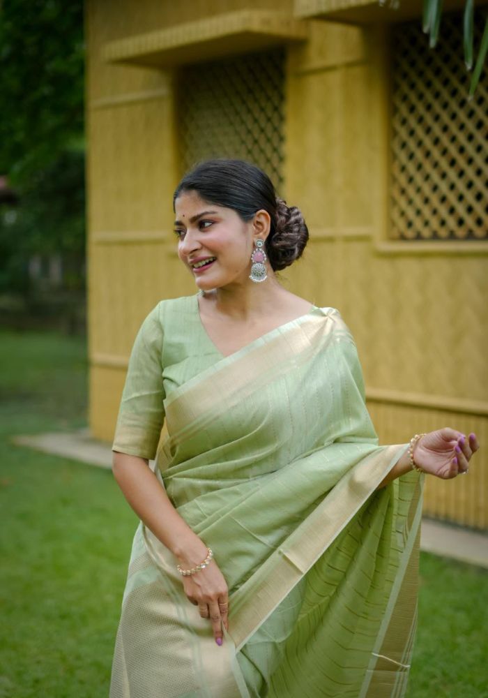 Delicate Pista Saree with Lustrous Finish and Gold Pallu