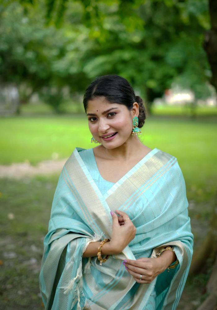 Delicate Sky Saree with Lustrous Finish and Gold Pallu