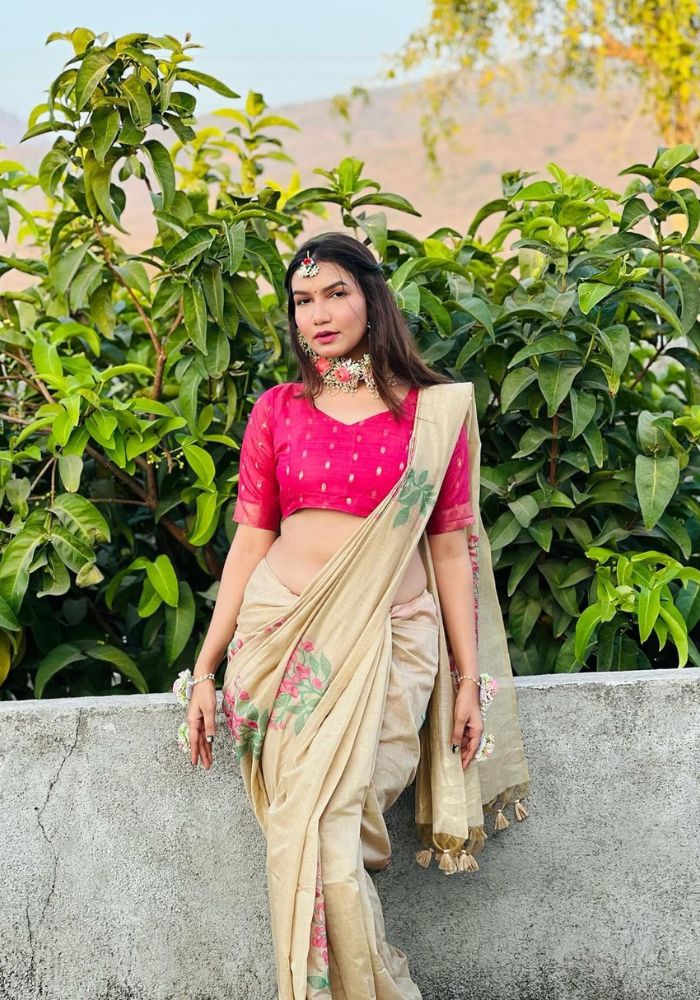 Elegant Floral Printed Beige Saree with Designer Pallu and Tassels