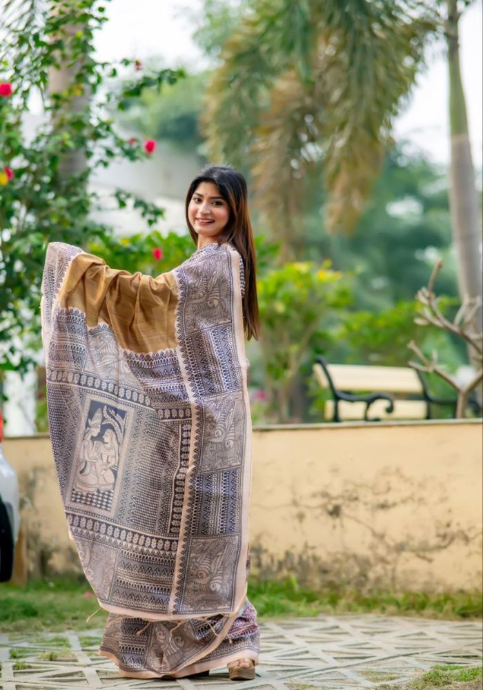 Trendy Festive Saree in Mustard with Heritage Tribal Art