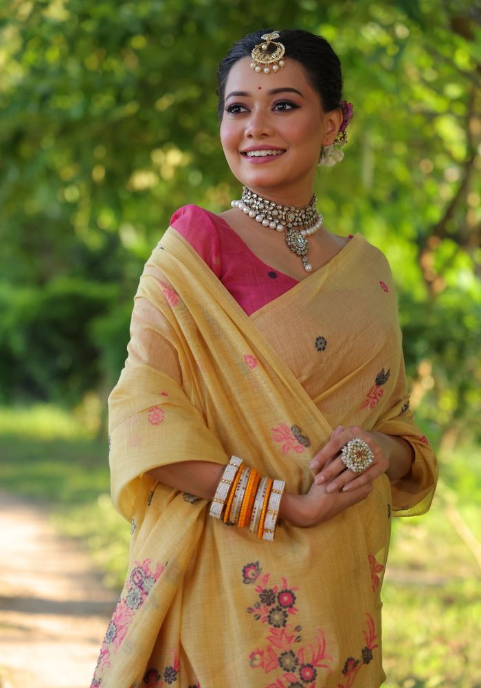 Graceful Soft Muga Yellow Cotton Saree with Resham Floral Weaving & Tassels