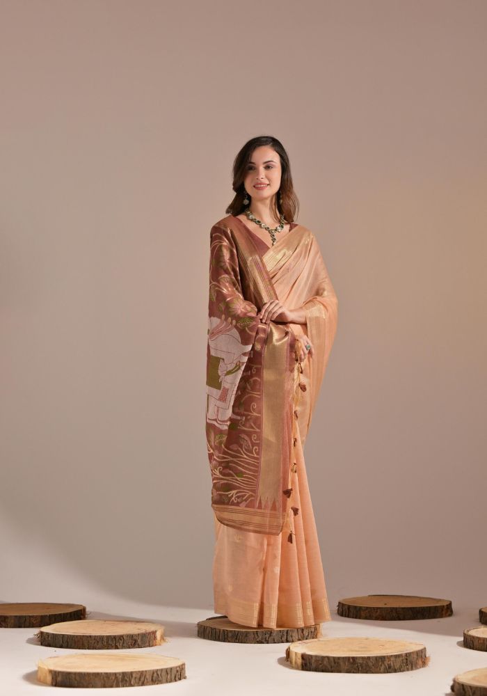 Festive Peach Sari with Embroidered Buttis and Bold Border
