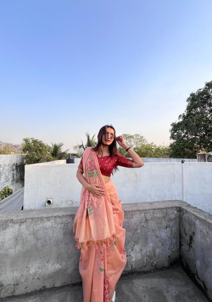 Elegant Floral Printed Peach Saree with Designer Pallu and Tassels