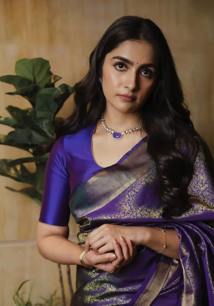 Woman in a purple saree