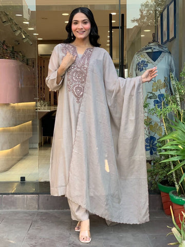Buy Beige Heavy Embroidered Muslin Cotton Flared Kurta Pant Set