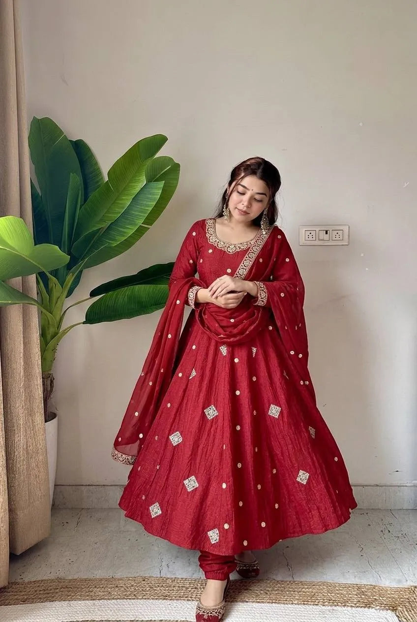 women maroon embroidered gown