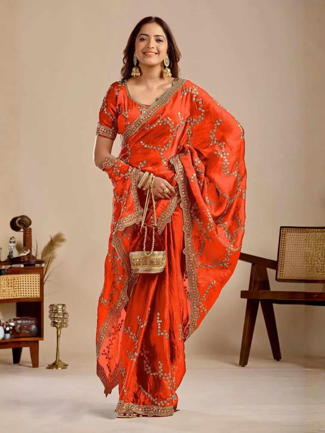 orange embroidered saree