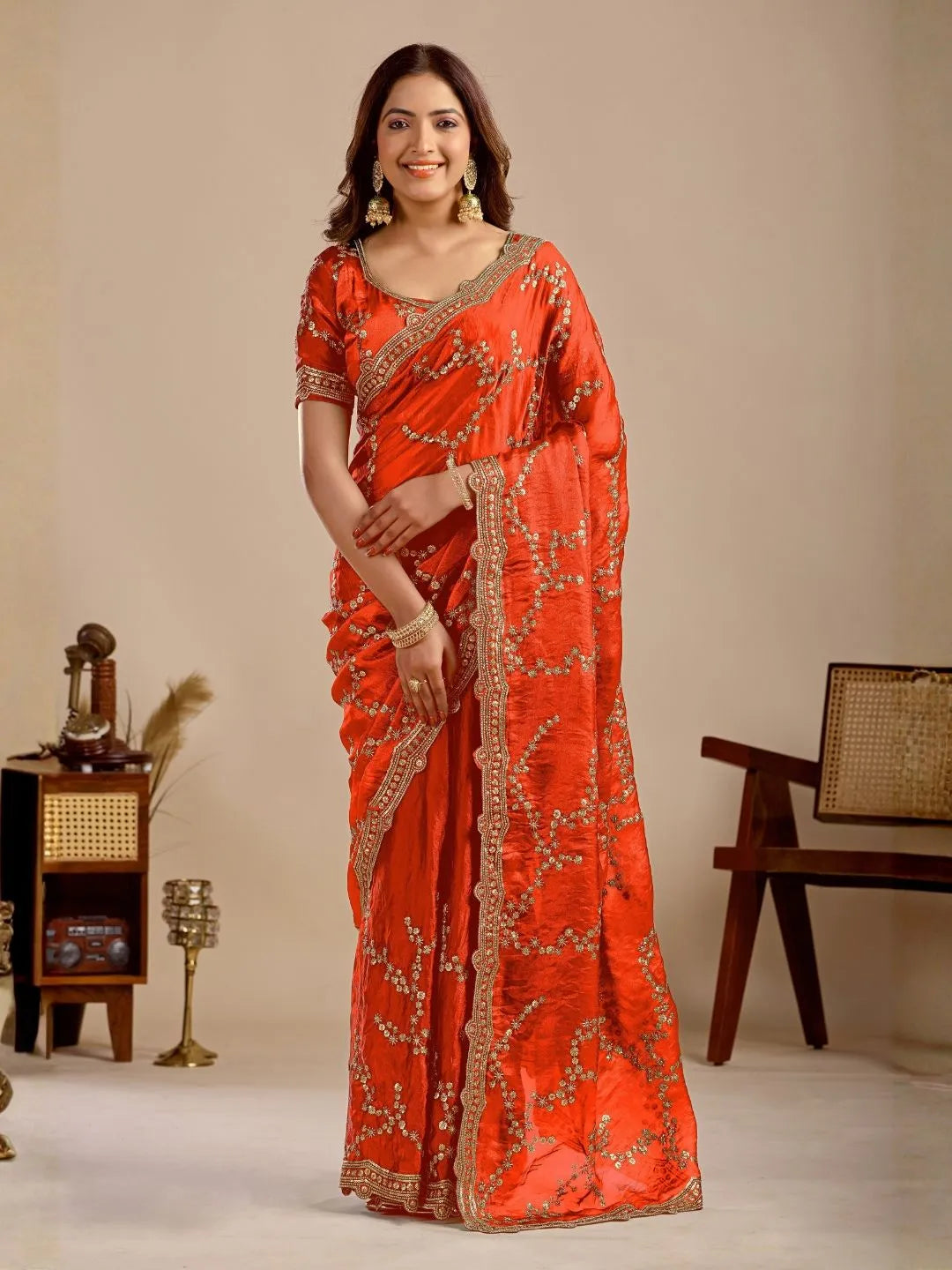 orange embroidered silk saree