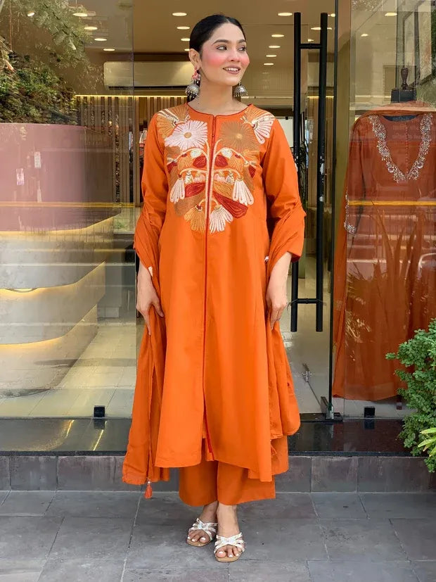 women orange silk kurta set