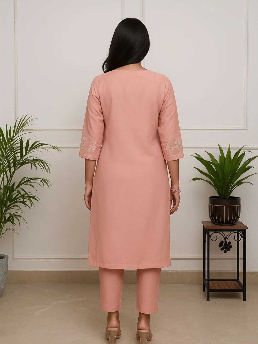 women peach embroidered kurta set